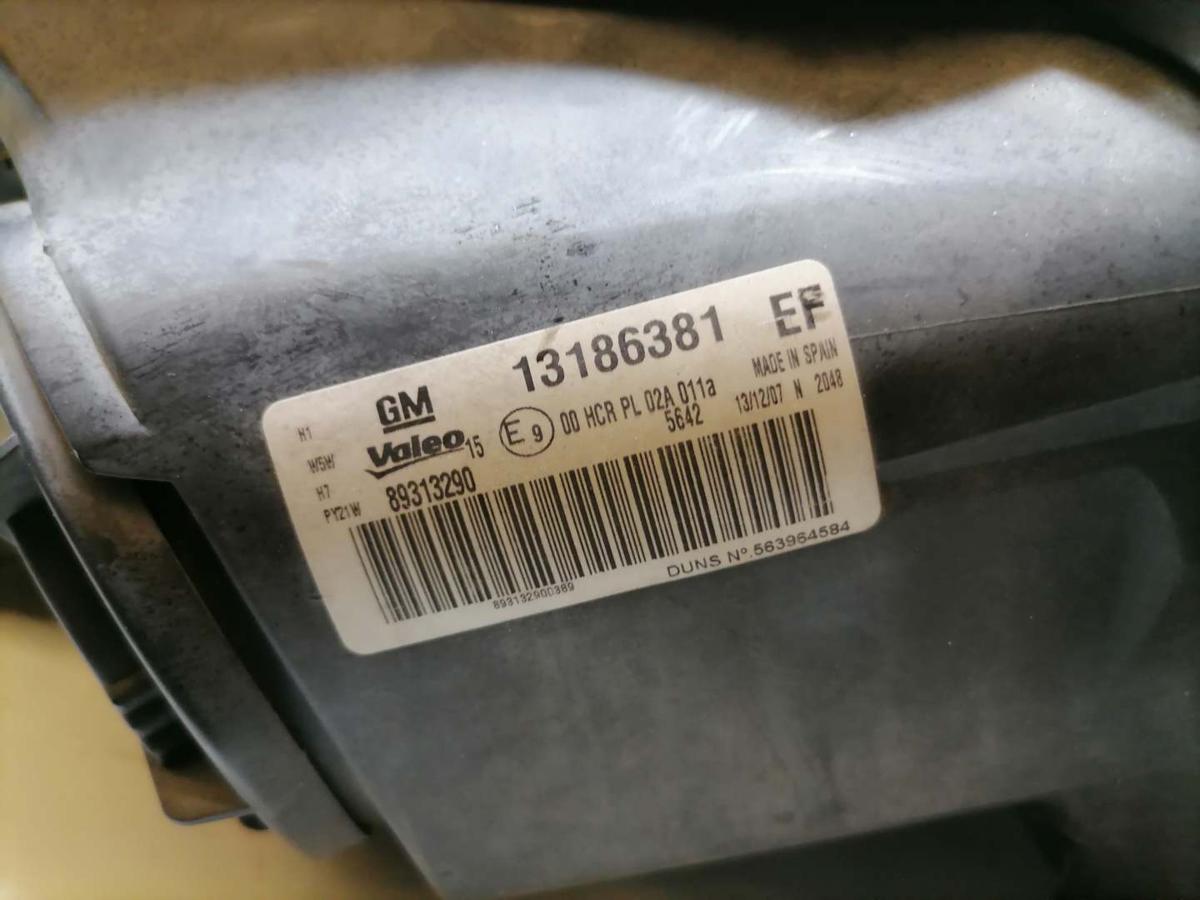 Opel Corsa D original Scheinwerfer links Halogen 13186381 BJ08